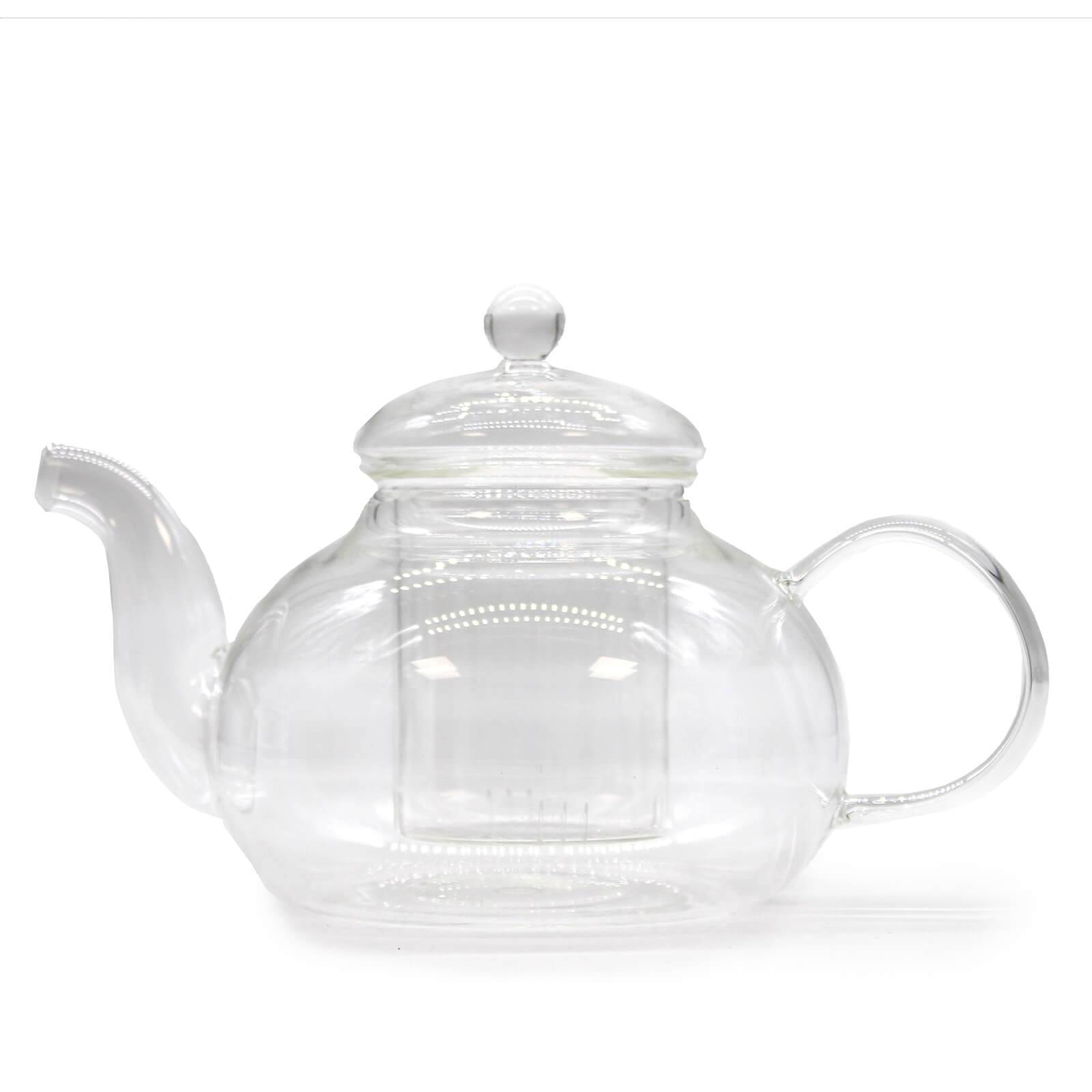 Clear glass teapot with a round body, a curved spout, a looped handle, and a fitted lid, photographed on a white background.