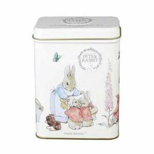 This charming white tin, branded with Beatrix Potter's beloved illustration, features the Flopsy Bunnies™, rabbits in clothing, flowers, a butterfly, and a bear. It's perfect for storing teabags and is ideal for fans of whimsical storytelling.