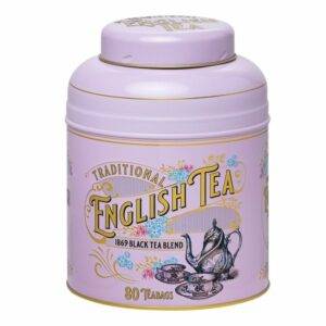 The Vintage Victorian tin labeled "1869 Black Tea Blend" offers a decorative floral design in purple with 80 teabags for a refined tea experience.