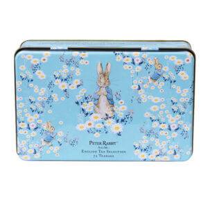This charming rectangular tin box, named "Beatrix Potter - Daisies," features a serene blue background with rabbits and flowers design. It offers an exquisite English tea selection with 72 delightful teabags for your enjoyment.