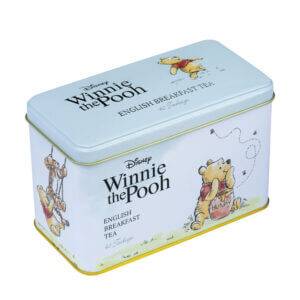 A charming tin featuring Winnie the Pooh illustrations, showcasing him savoring honey and swinging, adorned with "Winnie The Pooh - 40 Teabag Tin - English Breakfast" text.